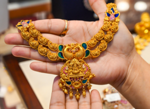 Gold, silver trade higher amid easing crude prices